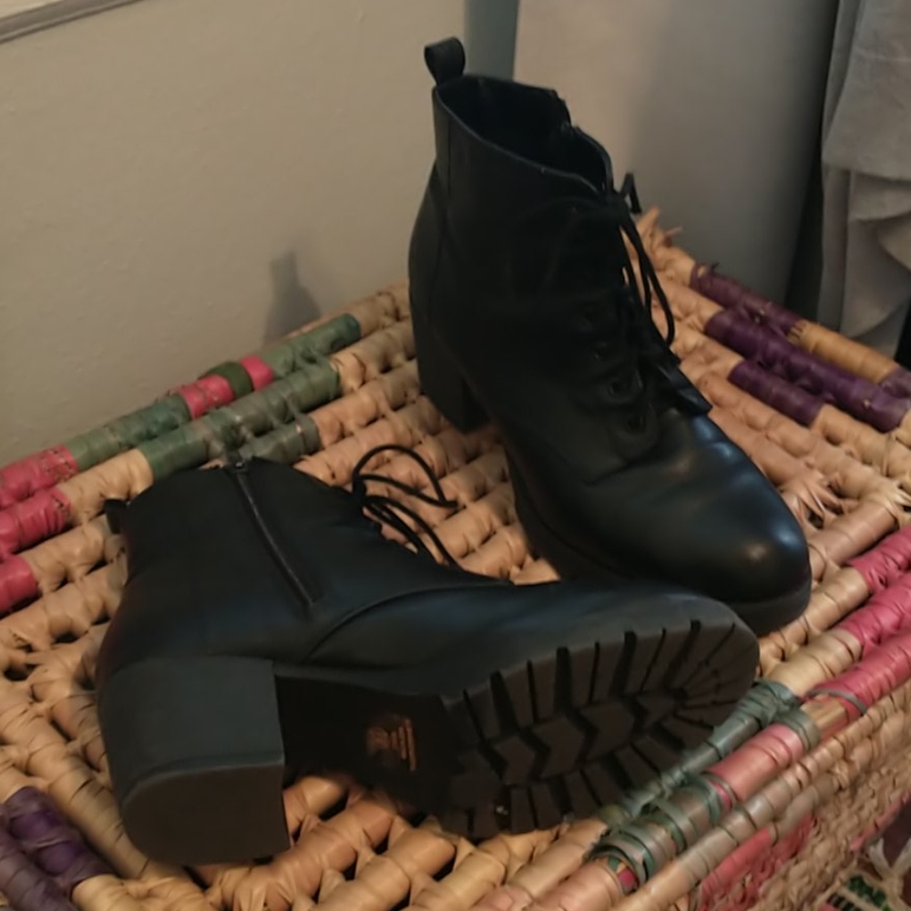 Black heeled combat boots